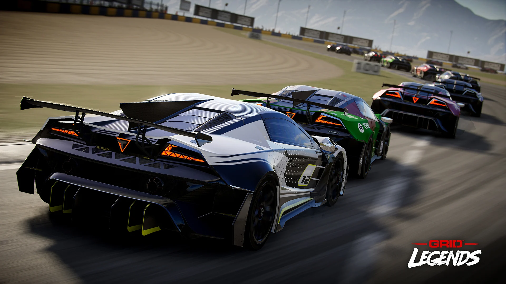 Cars racing through an urban street.