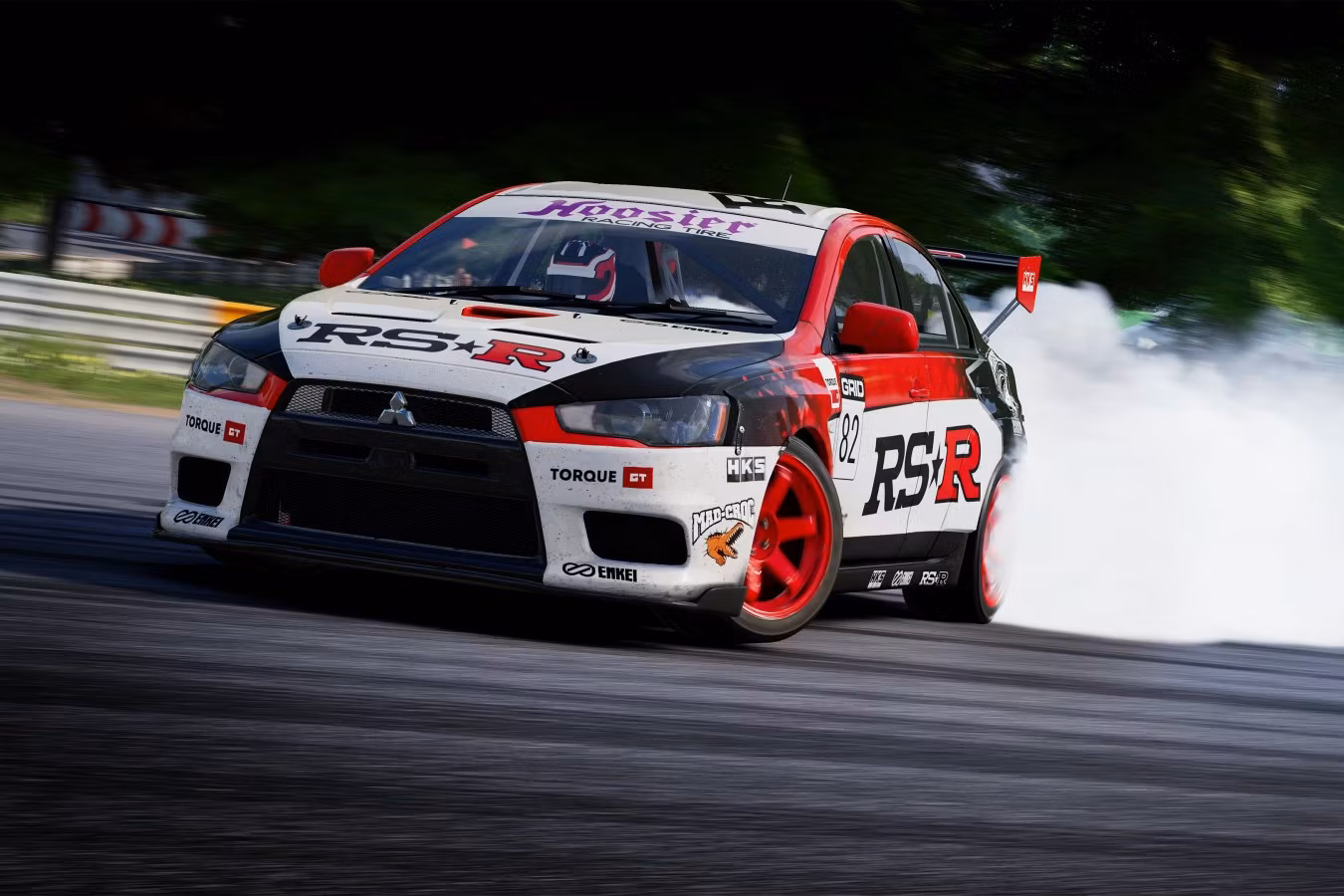 Cars racing through an urban street circuit.